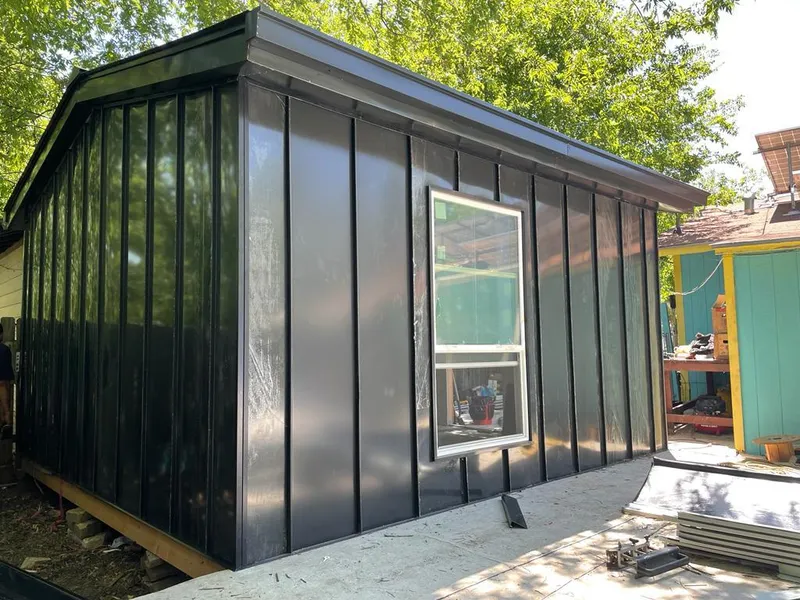 Black standing seam metal wall panels for Metal Roof Installation in Hales Corners